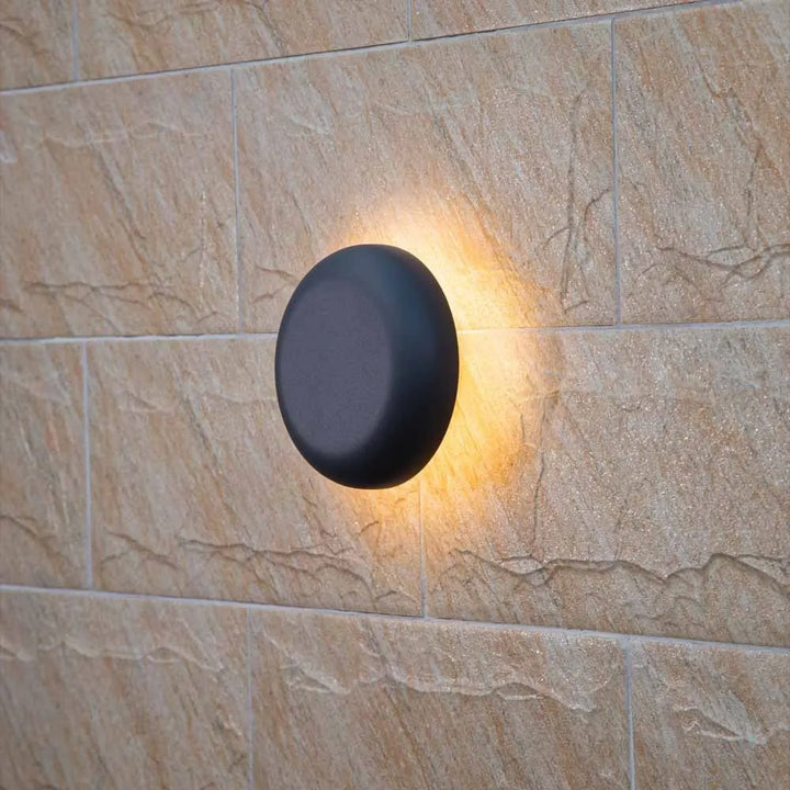 CELESTIAL GLOW LED Wall Light illuminated from the side – Bright, energy-efficient lighting for modern spaces with sleek design.