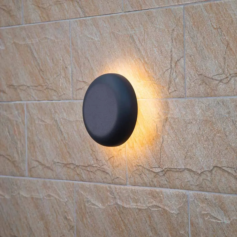 CELESTIAL GLOW LED Wall Light illuminated from the side – Bright, energy-efficient lighting for modern spaces with sleek design.