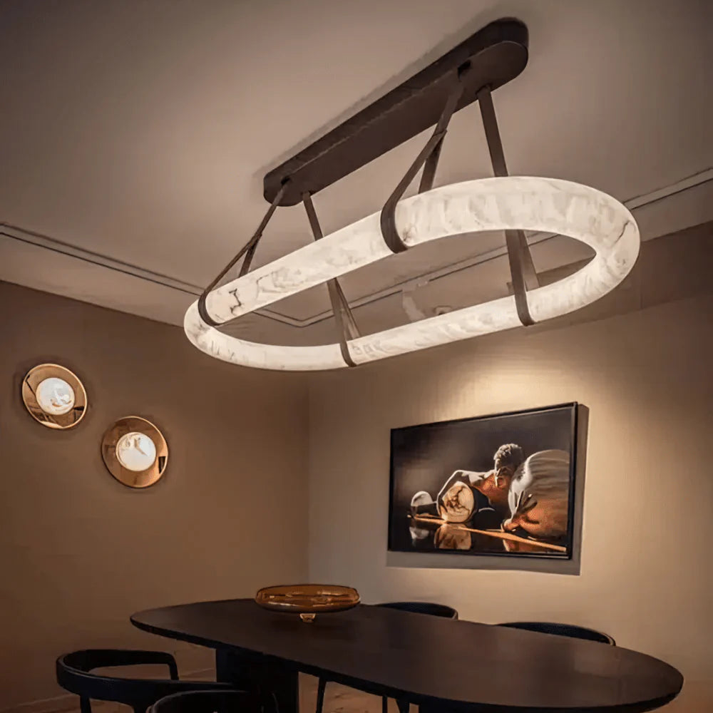 Circle alabaster chandelier in dining area – elegant modern lighting for stylish interiors