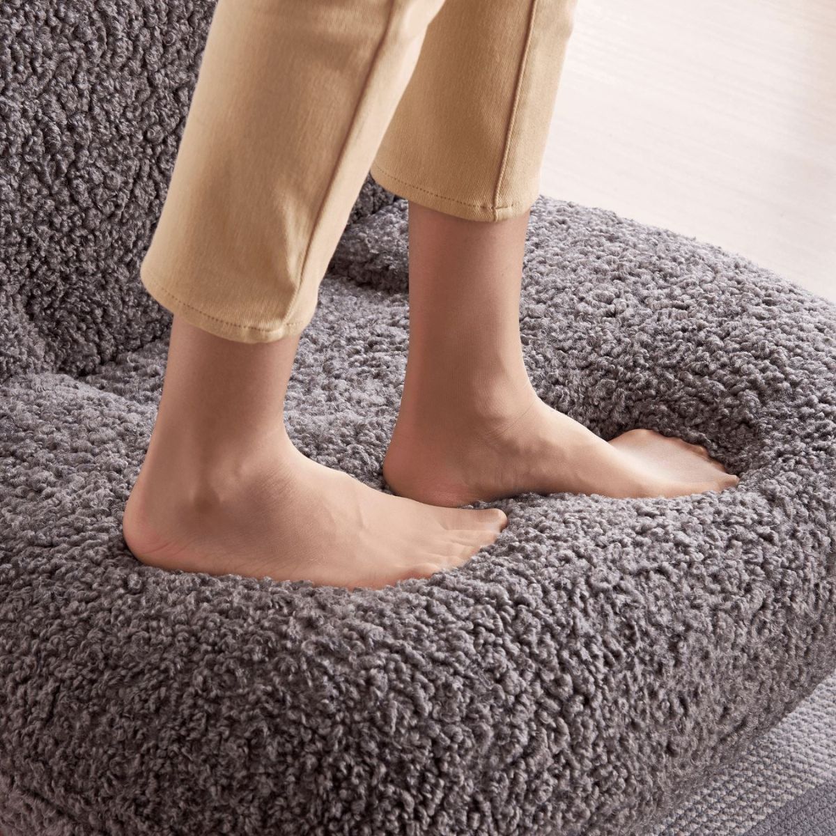 Cloud swivel lounge chair soft cushion close-up showing plush texture and comfort
