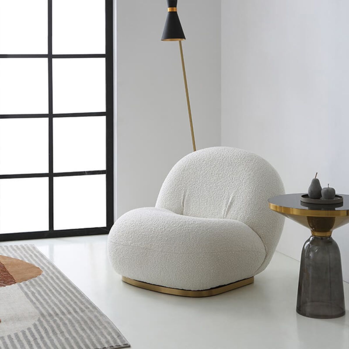 Side view of Cloud swivel lounge chair highlighting sleek design and plush cushioning