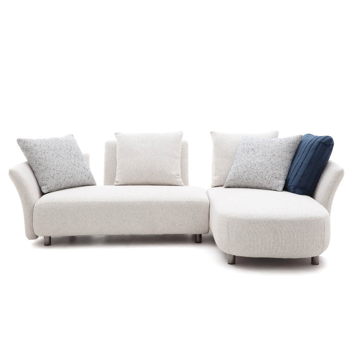 Top angle close-up of Coastal Curve sofa lounge highlighting cushioned seat and curved armrest design.