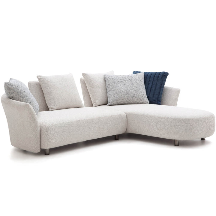 Detailed close-up of Coastal Curve sofa lounge showing soft upholstery and curved armrest.
