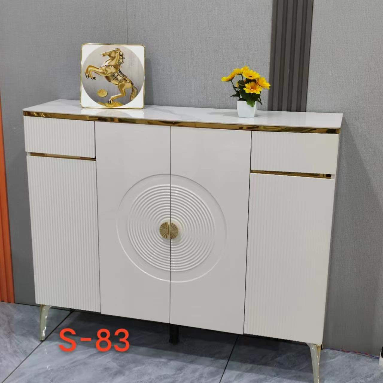Compact shoe cabinet with multiple shelves, offering organized storage in a sleek, space-saving design