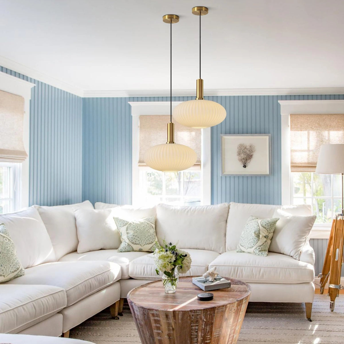 30 cm cozy glow pendant light with matte gold shade, creating a warm living room ambiance