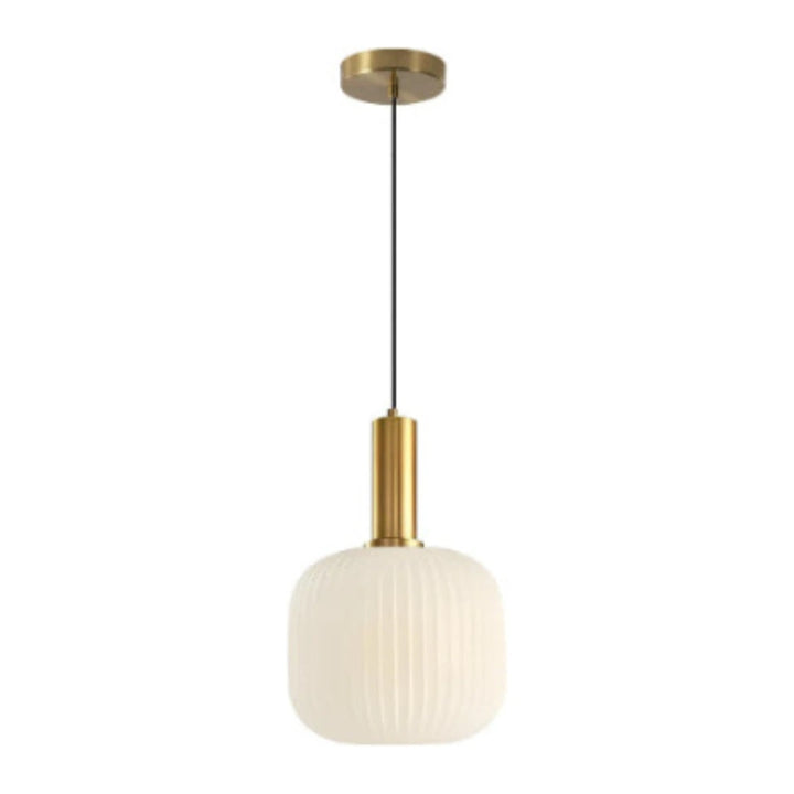 Cozy glow gold pendant light illuminating a warm and inviting space.