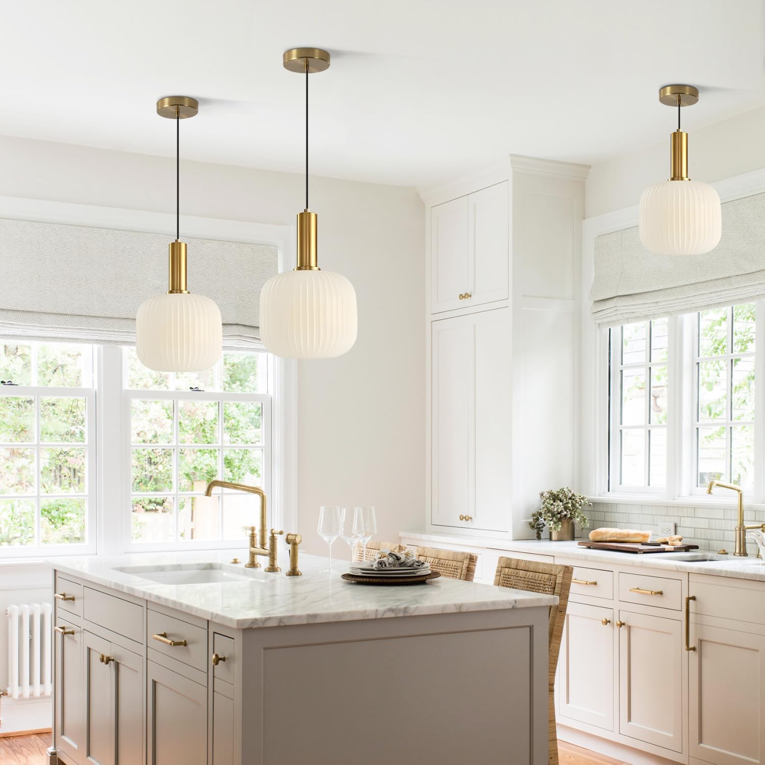 Cozy glow gold pendant light illuminating a warm and inviting space.