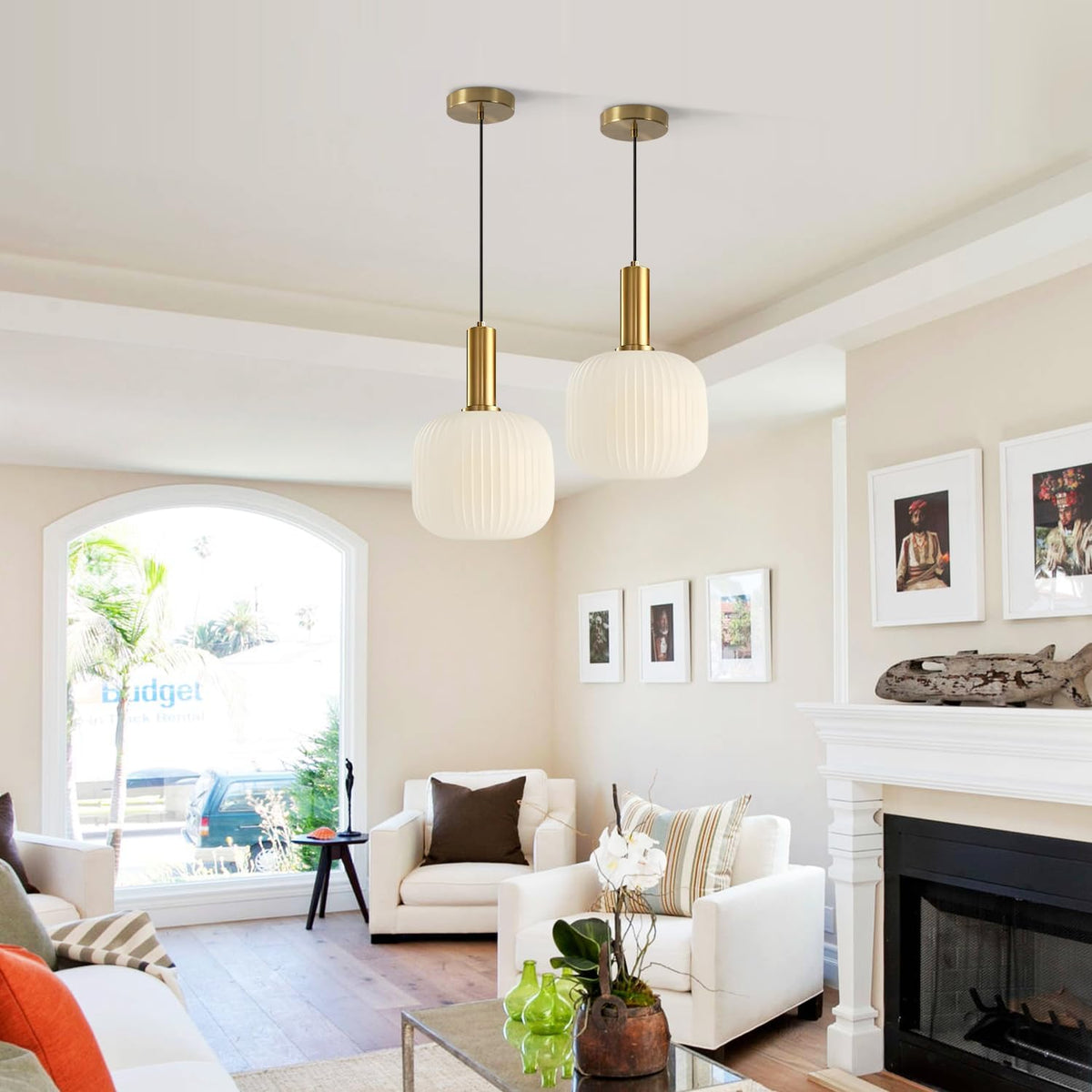 Cozy glow gold pendant light enhancing the ambiance of a stylish living room