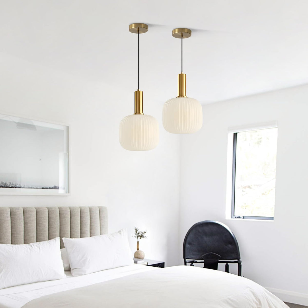 Cozy glow gold pendant light creating a warm and serene atmosphere in a bedroom