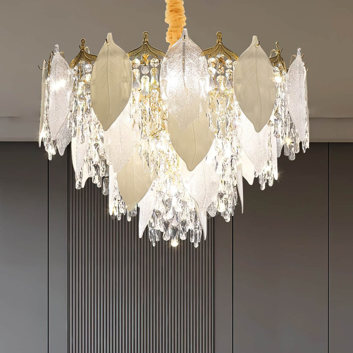 Crystal leaf chandelier light in luxury room, illuminating the space with sparkling leaf-shaped crystals and elegant design.