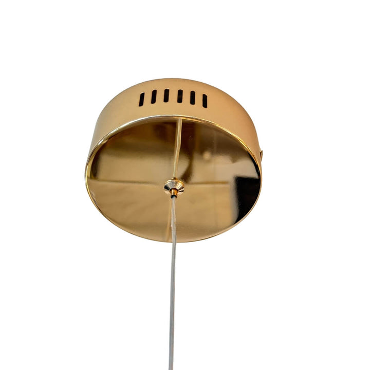 Crystal prism pendant light with gold and copper finish, integrated LED, combining luxurious materials for modern elegant lighting