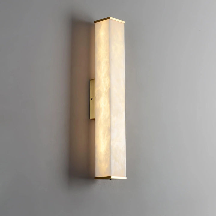 Elegant cuboid alabaster wall lamp with marble side view for stylish interiors