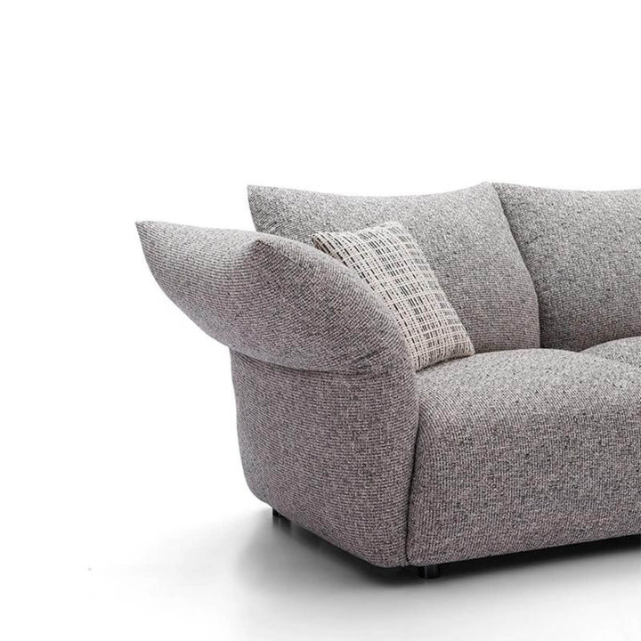 Left side view of Cushy Cocoon KS31 sofa with luxurious chenille upholstery – modern design featuring plush cushions and elegant contours
