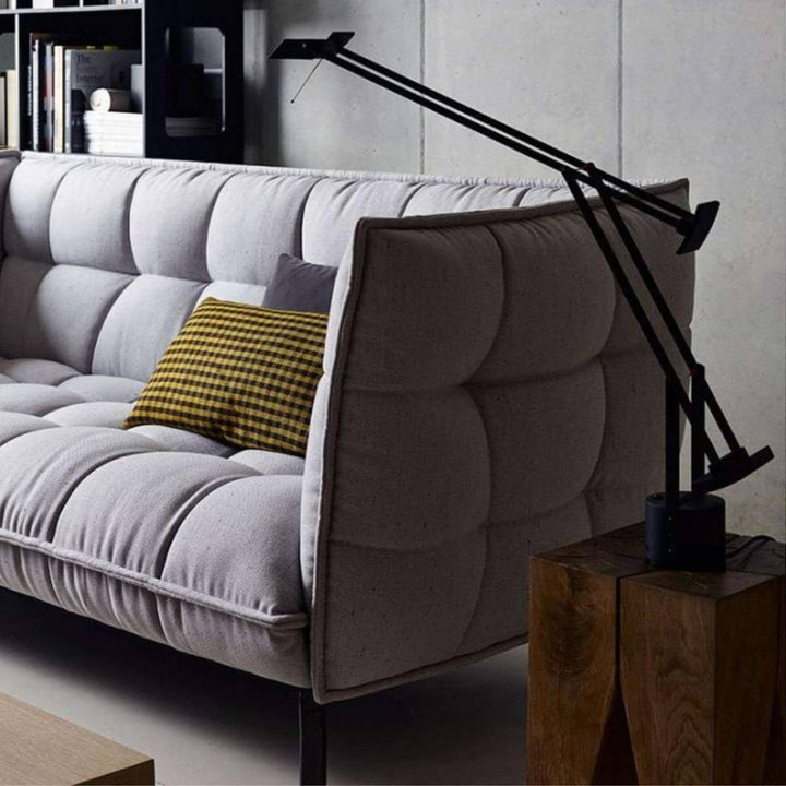 Right side view of custom AeroLuxe gray linen sofa with modern design and plush cushions