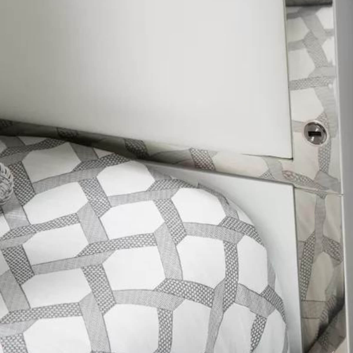 Detailed view of Classic Comfort canopy velvet bed showcasing plush upholstery and elegant frame design
