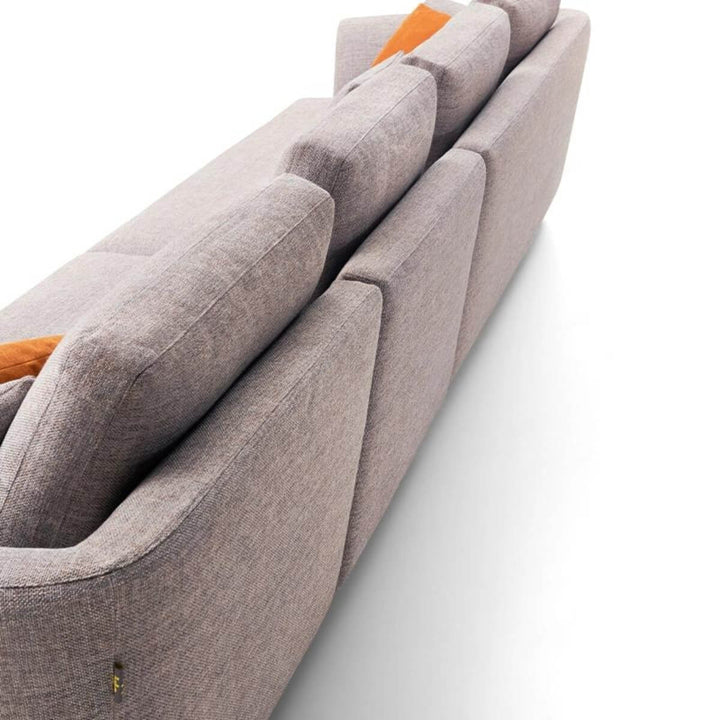 Back view of custom classic couch with elegant chaise sofa design – smooth upholstery and clean lines showcasing refined craftsmanship