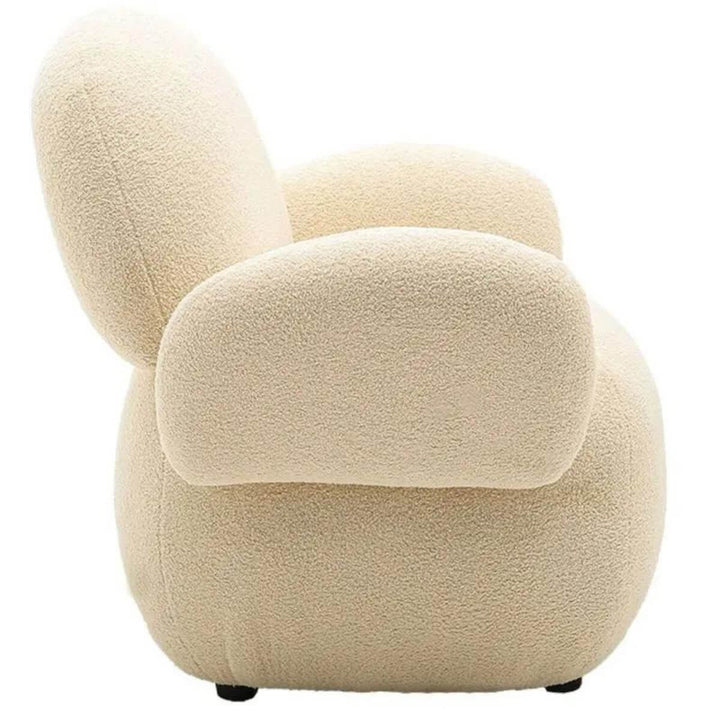 Side view of custom Cuddly Teddy fabric leisure lounge chair showcasing plush upholstery and cozy design