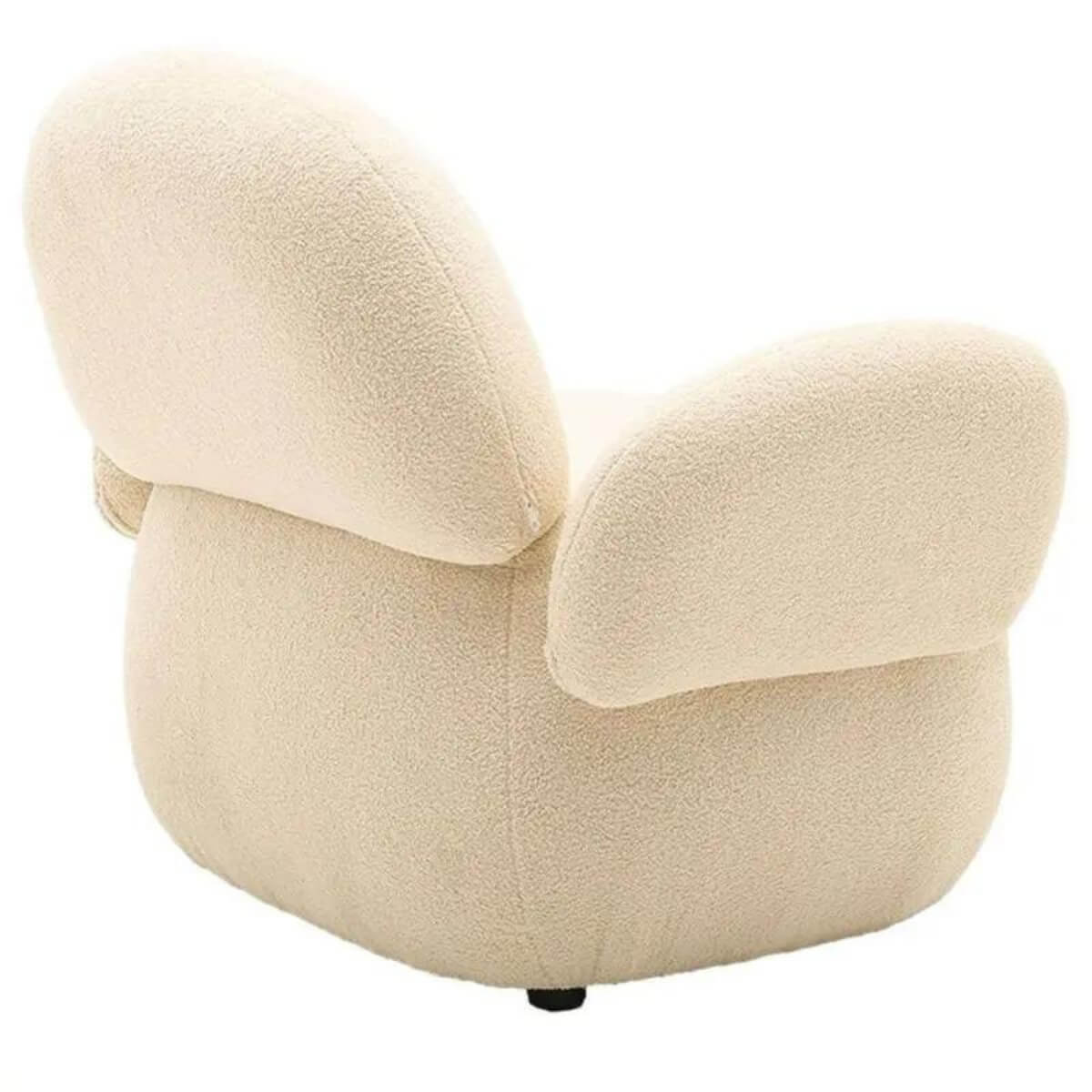 Angled back view of custom Cuddly Teddy fabric leisure lounge chair showing plush cushions and cozy feel