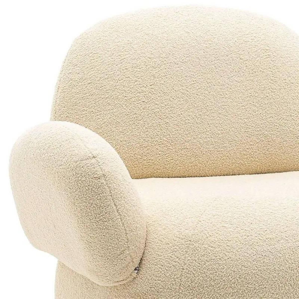 Left side detail of custom Cuddly Teddy fabric leisure lounge chair highlighting soft upholstery texture