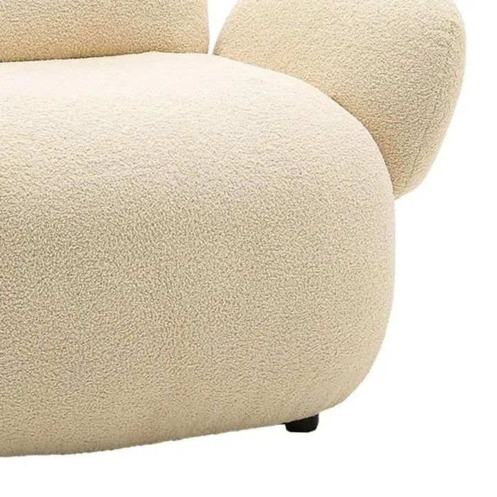 Close-up detail of custom Cuddly Teddy fabric leisure lounge chair showing soft upholstery texture
