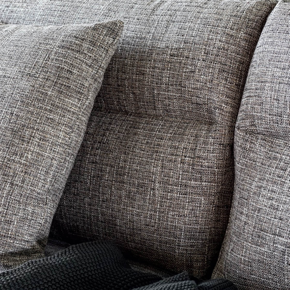 Close-up details of custom Dreamwave sofa showcasing cotton linen fabric and fine craftsmanship