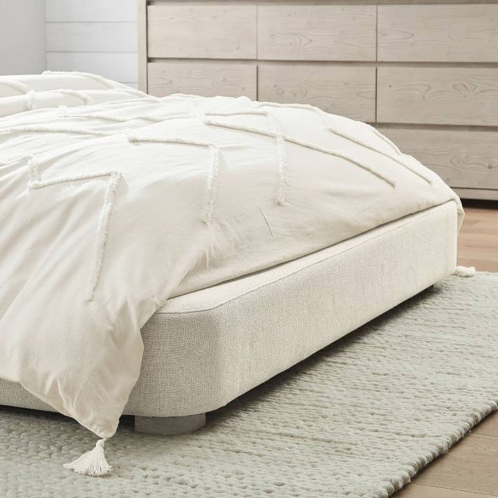 Lower view of Elegant Ergo wooden frame cotton linen bed showcasing solid wood base and fabric texture