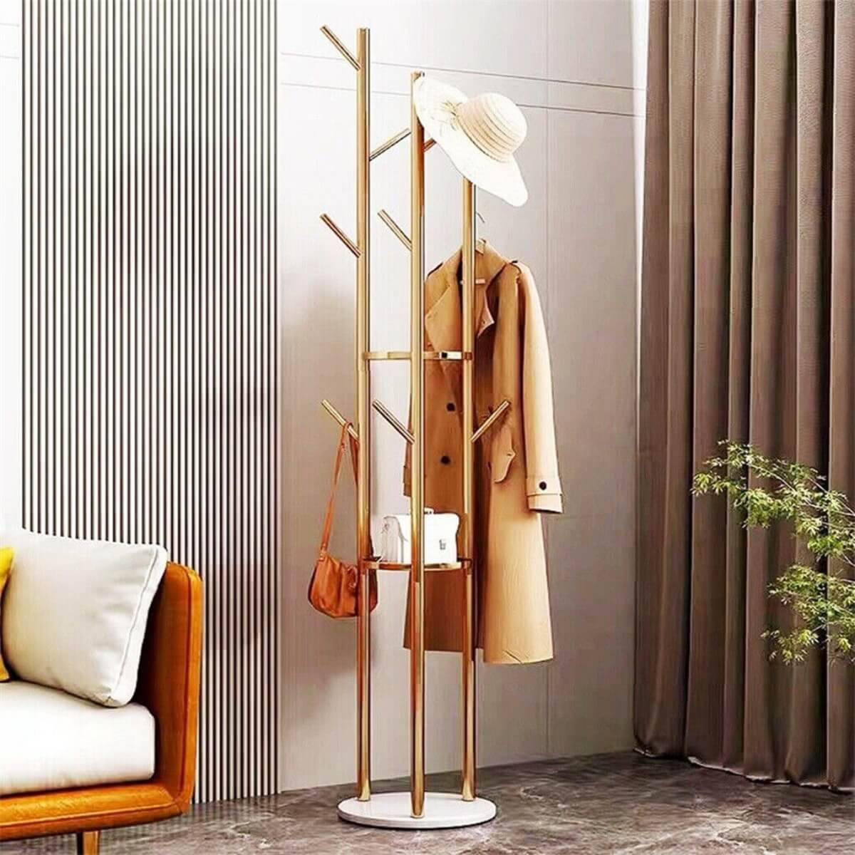 Custom Garment Grove clothes rack with marble base in a bedroom setting – stylish and functional storage solution with elegant design