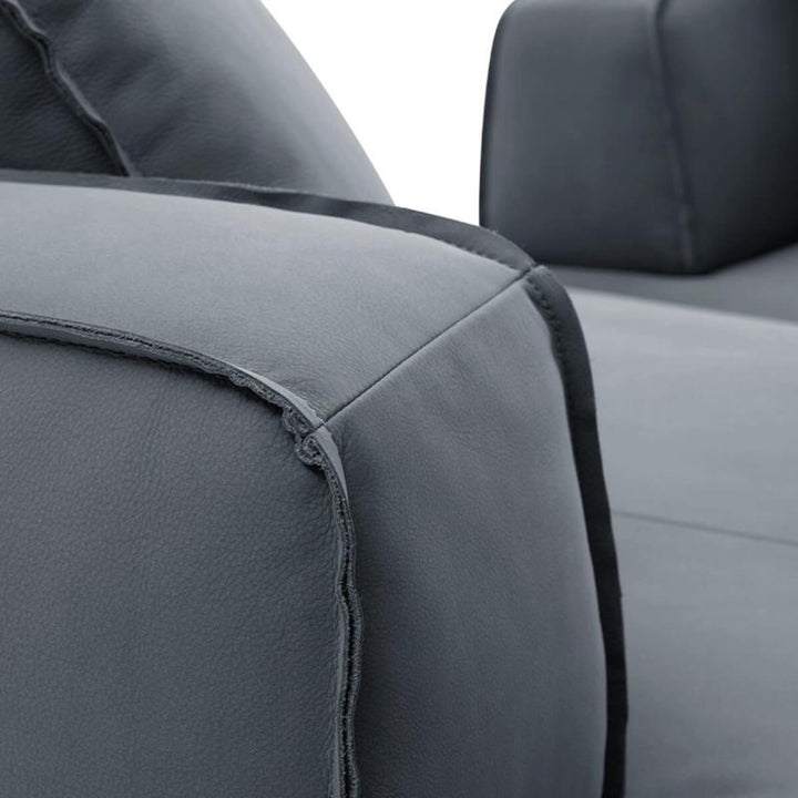 Close-up detail of custom Gossamer KS32 sofa showcasing cotton-linen fabric texture and fine craftsmanship