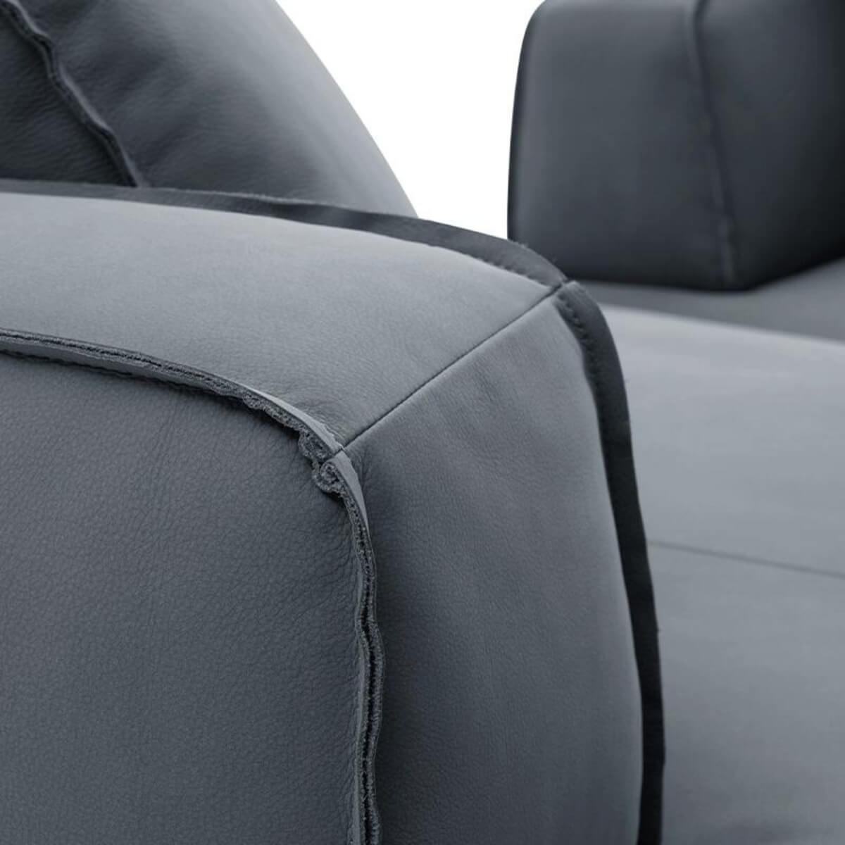 Close-up detail of custom Gossamer KS32 sofa showcasing cotton-linen fabric texture and fine craftsmanship