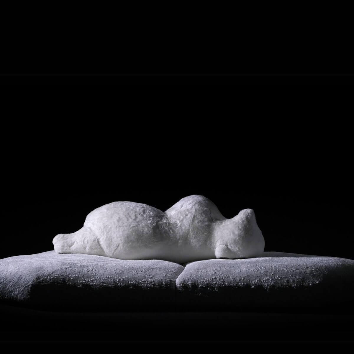 Custom-made AuroraArray teddy sofa with plush upholstery and curved modern design