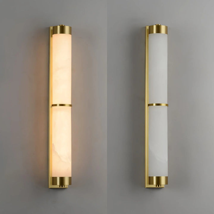 Cylindra alabaster brass wall light shown on and off from front view, highlighting modern elegant design