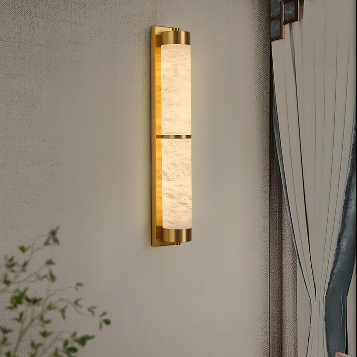 Cylindra Alabaster Brass Wall Light side view with golden wall mount elegant modern design