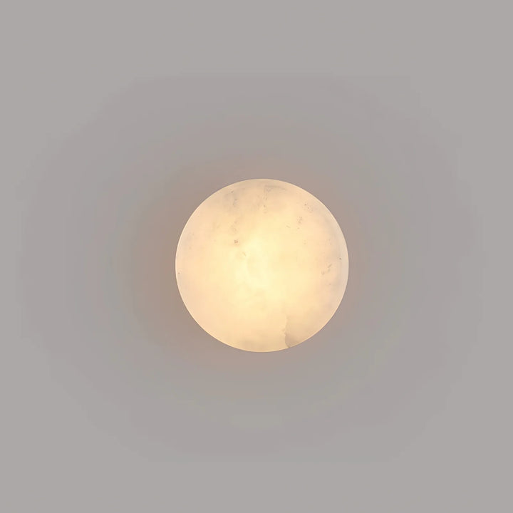 Front view of cylindrical alabaster wall light for modern and elegant home lighting décor