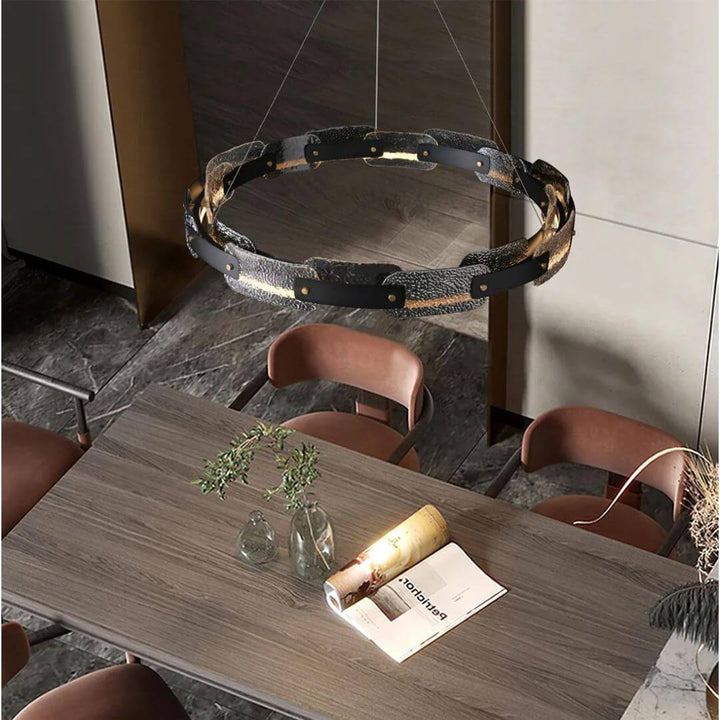 Top view of Dazzle single-tier chandelier light above dining table in Australia, showcasing elegant crystal layout and radiant design