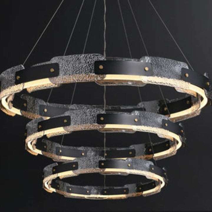 Dazzle three-tier chandelier light turned on in luxury room, illuminating the space with radiant elegance and layered sparkle
