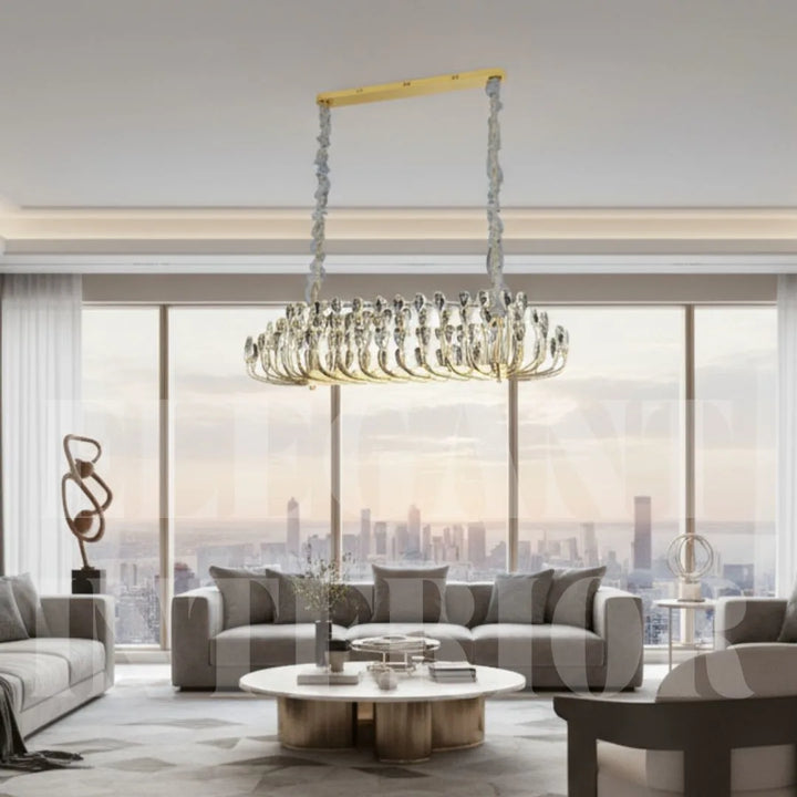 Donya Crystal Blossom gold branch chandelier illuminating a luxurious modern living room interior