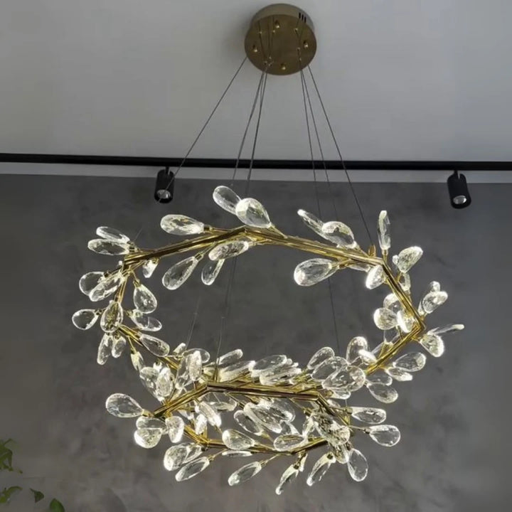 Bottom angle view of Donya Crystal Branch LED Chandelier highlighting layered crystals and gold detailing