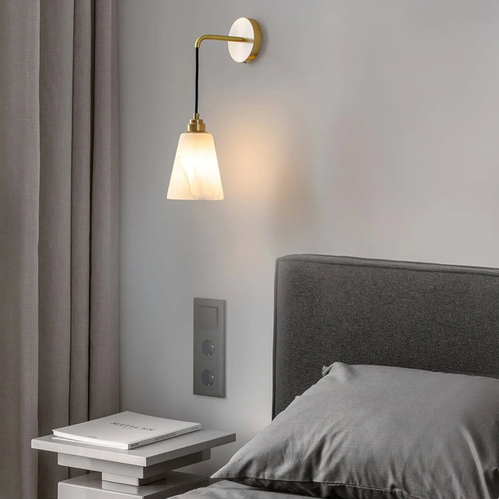 Bedside view of droplet alabaster wall lamp for modern bedroom lighting décor