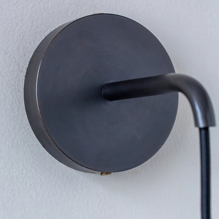 Close view of droplet alabaster wall lamp mounted on wall for modern home décor lighting