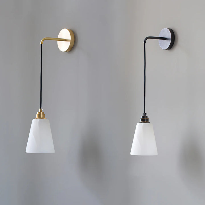 Droplet alabaster wall lamp shown in two colors, gold and black, for modern home décor