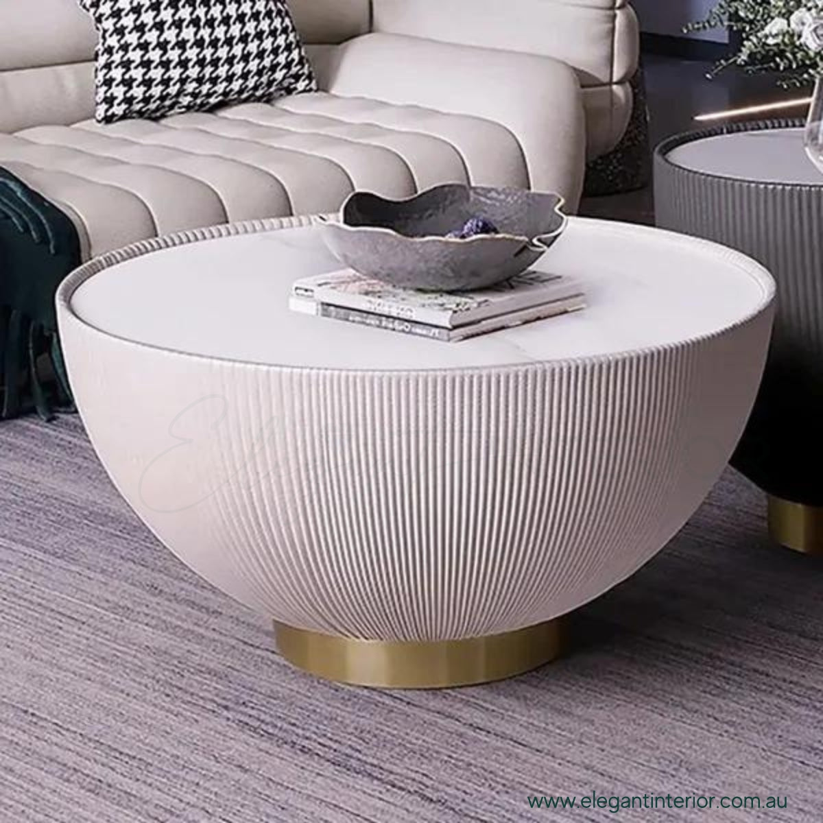 Side view of Round Drum coffee table with sintered stone top and modern minimalist design