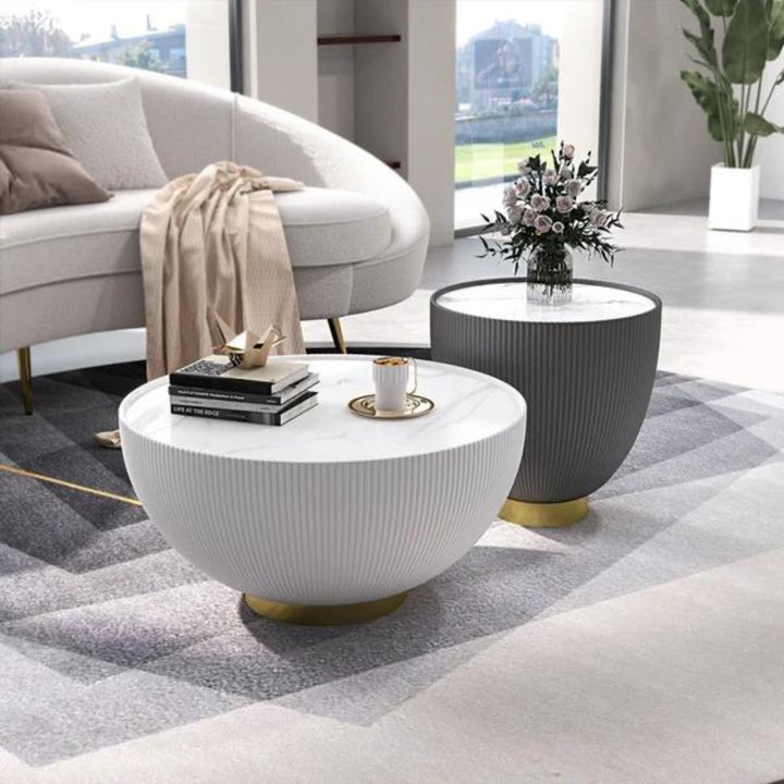 Side view of Drum coffee table with sintered stone top and PU leather base in elegant interior