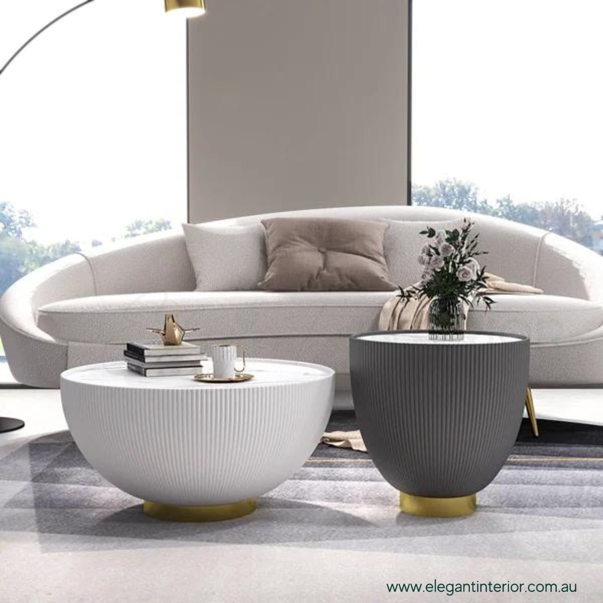 Side view of Round Drum coffee table with durable sintered stone top and modern design