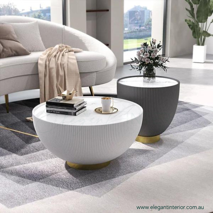 Side view of Round Drum coffee table featuring sintered stone top and contemporary round design
