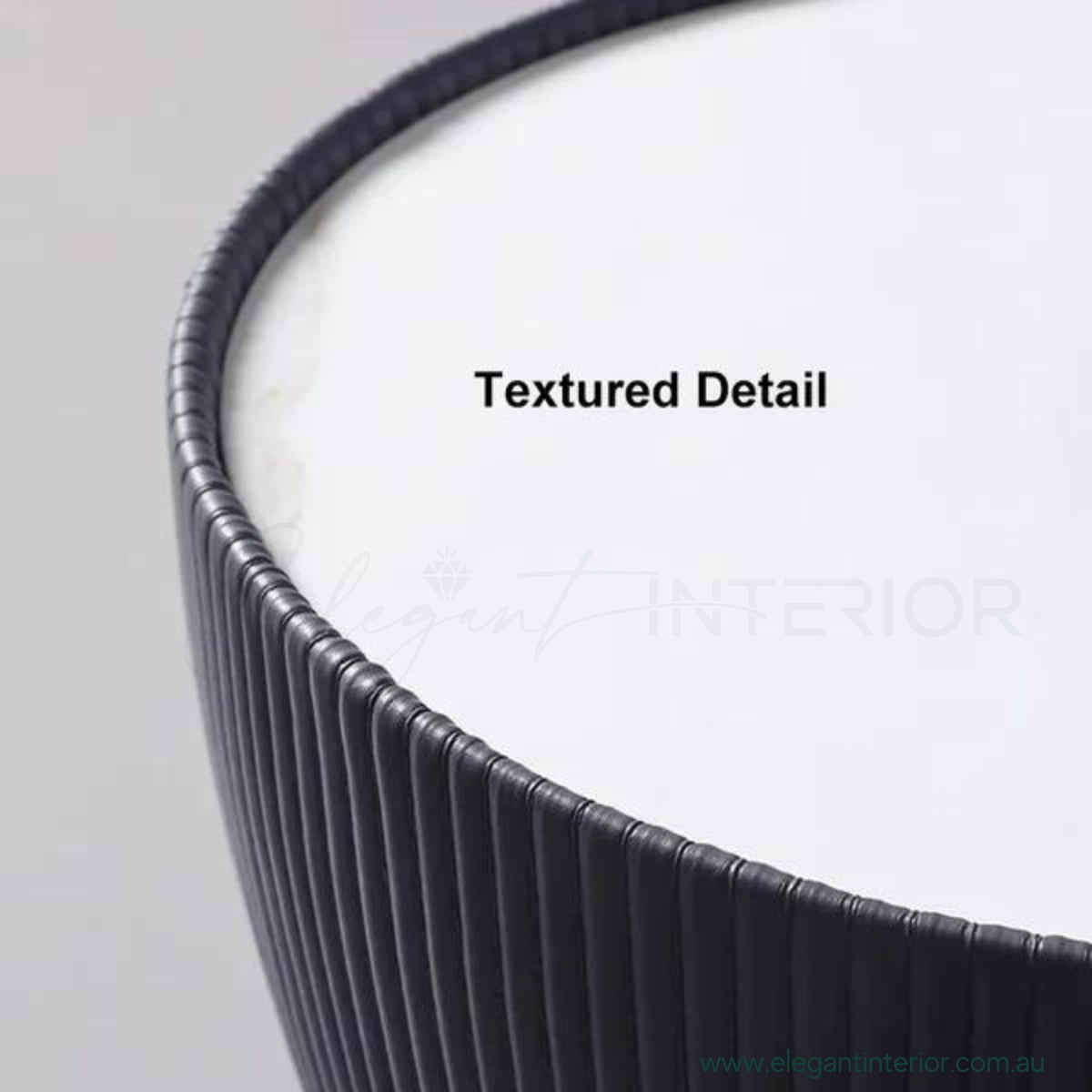 Close-up textured detail of Round Drum coffee table with sintered stone top and elegant finish