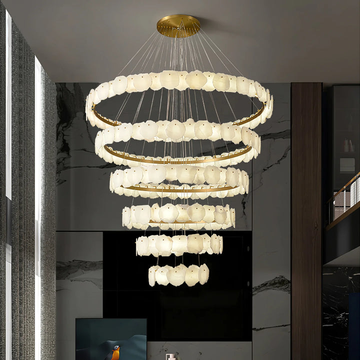 Ecliptica spiral alabaster chandelier luxury lighting enhancing a living room with elegant design