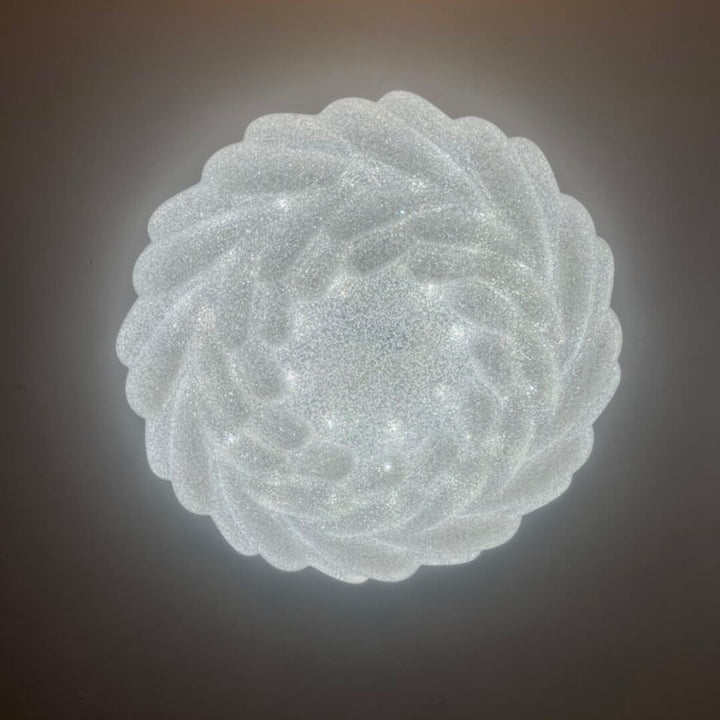 Eclipse Home Luminance flush mount ceiling light with sleek modern design, providing soft ambient lighting for elegant interiors