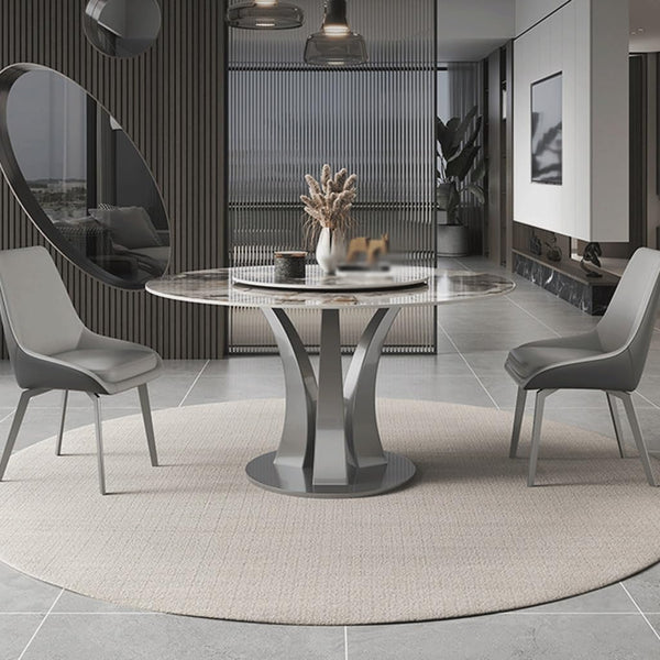 Custom-made round dining table with elegant design, featuring smooth metal finish, perfect for sophisticated interior settings