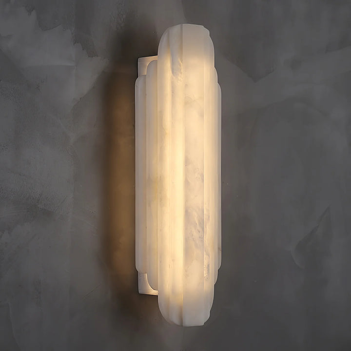 Side view of Estelle alabaster wall sconce lighting, highlighting its sleek and elegant design.