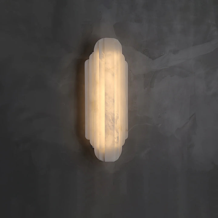 Side view of Estelle alabaster wall sconce lighting, highlighting its stylish design and smooth finish.